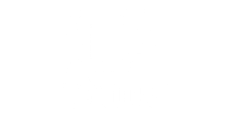 LA Times logo in white Gothic script on a green background.